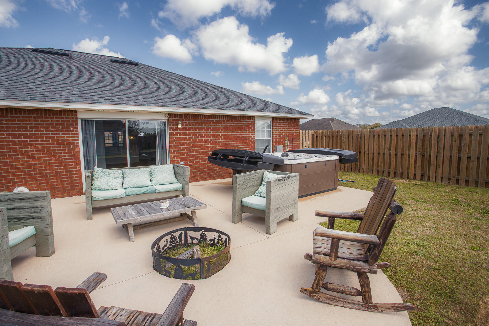 2233 Lewis Street Crestview, FL 32536 - Photo 20 of 24 a view of a chairs and tables in the patio