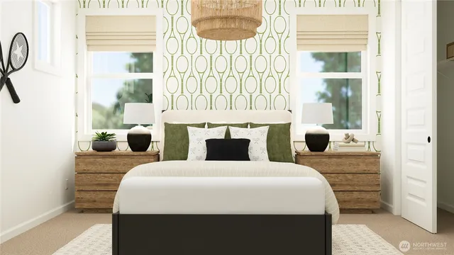 a large bed sitting in front of a window