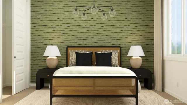 a bedroom with a bed and a chandelier