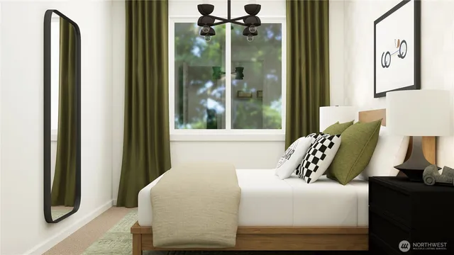 a bedroom with a bed and large mirror