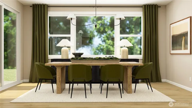 a dining room with furniture and window