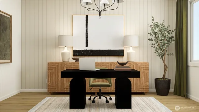 a view of a workspace with furniture and wooden floor