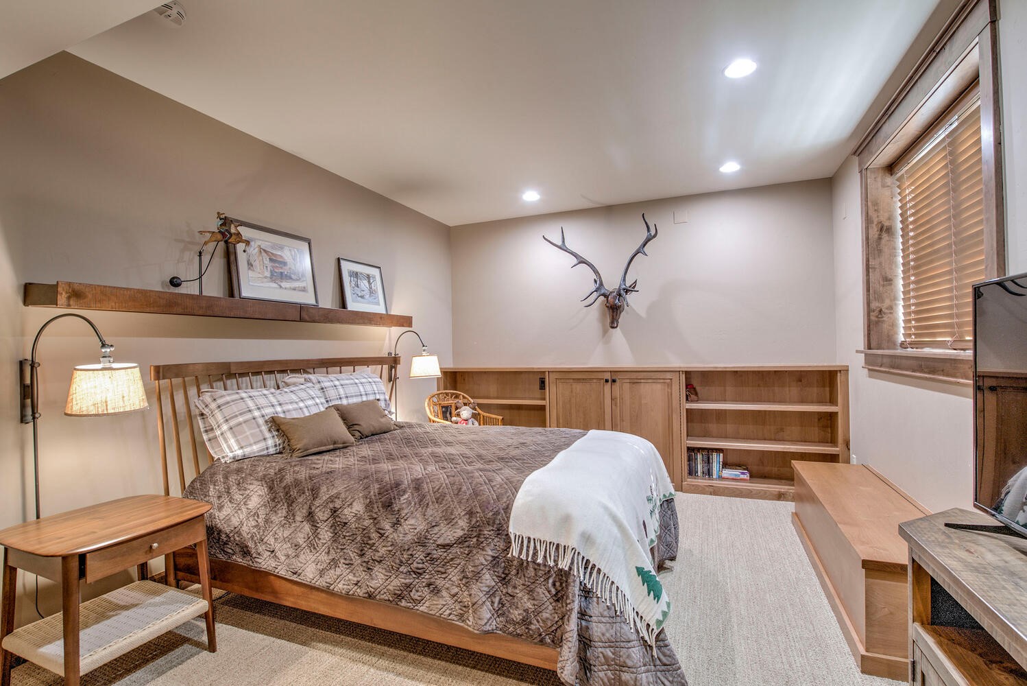 862 Penstemon Road Keystone, CO 80435 - Photo 40 of 49 bedroom 5 plenty of room with a walk in closet and access to hidden storage behind the cabinet doors.