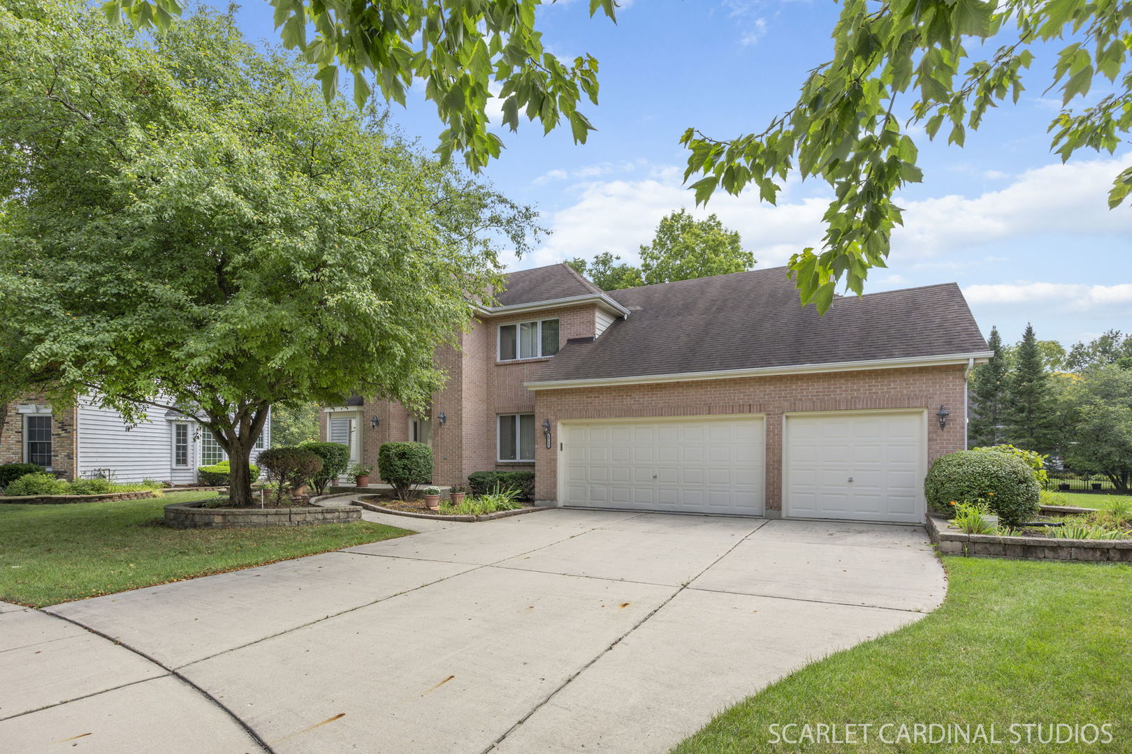 a house view with a garden space