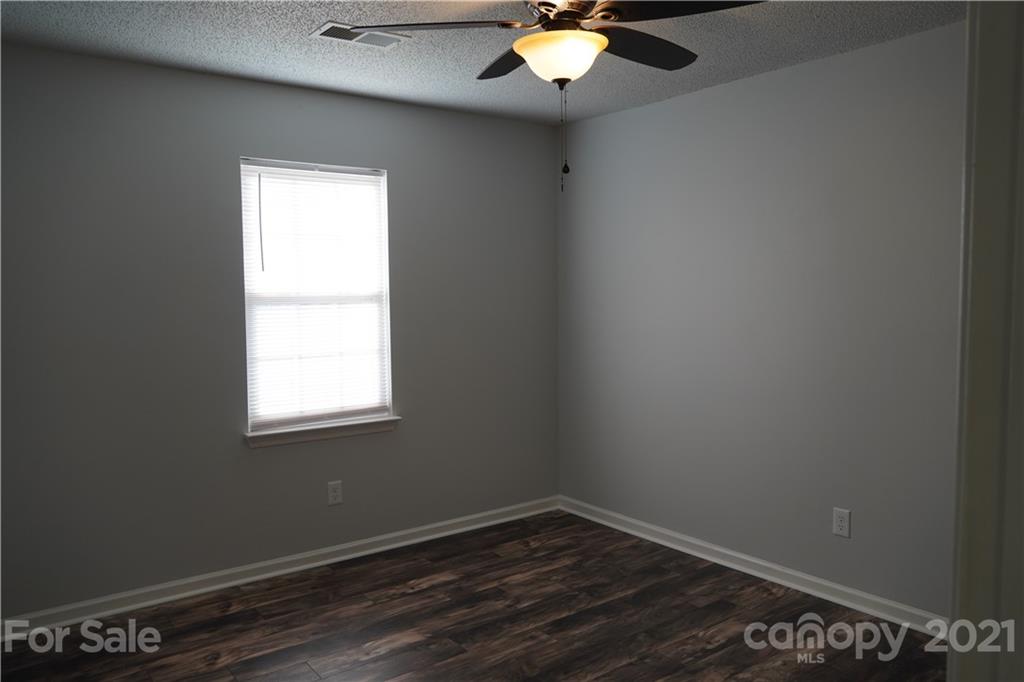 15220 Leslie Brooke Road Huntersville, NC 28078 - Photo 17 of 20 an empty room with a window
