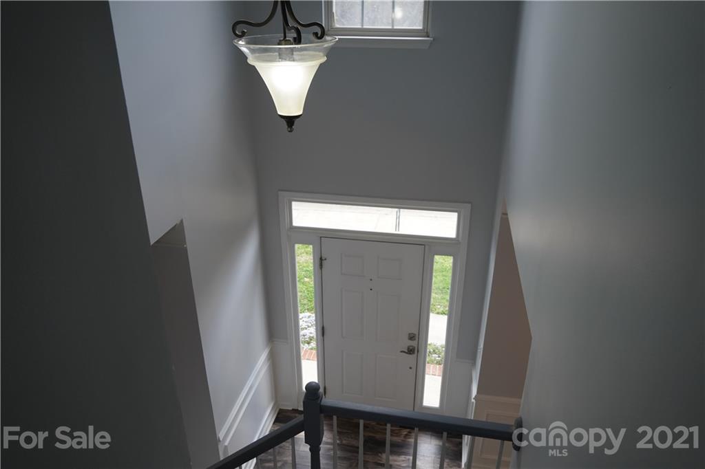 15220 Leslie Brooke Road Huntersville, NC 28078 - Photo 4 of 20 a view of staircase with wooden floor
