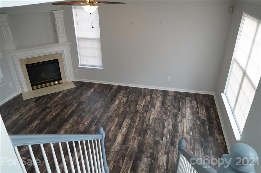 15220 Leslie Brooke Road Huntersville, NC 28078 - Photo 8 of 20 a view of wooden floor and fireplace