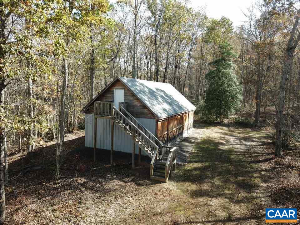 3454 Firehouse Road Howardsville, VA 24562 - Photo 2 of 9 a view of a house with a yard