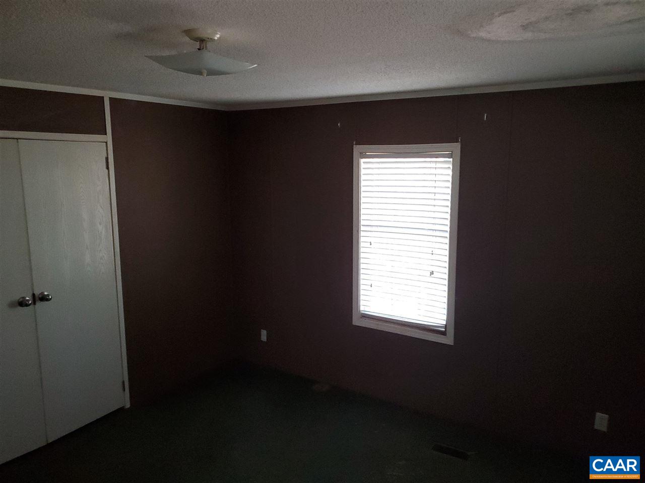 3454 Firehouse Road Howardsville, VA 24562 - Photo 9 of 9 a view of an empty room with a window