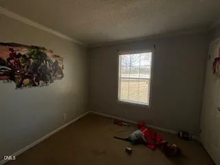 a room with a window and a fan