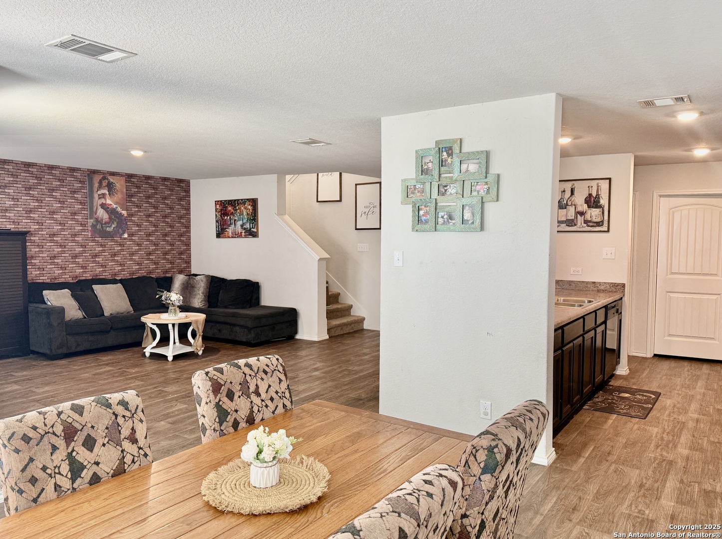 4002 Winterfell Pass Converse, TX 78109 - Photo 3 of 35 a living room with furniture and a wooden floor