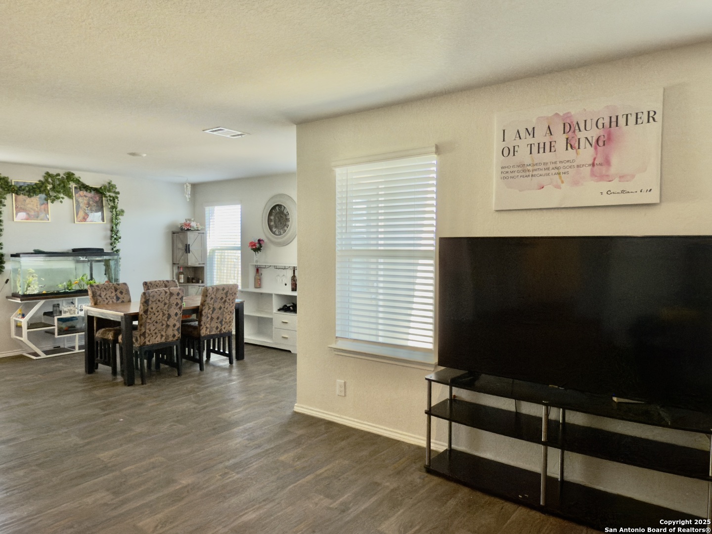 4002 Winterfell Pass Converse, TX 78109 - Photo 7 of 35 a view of a livingroom with furniture and a flat screen tv