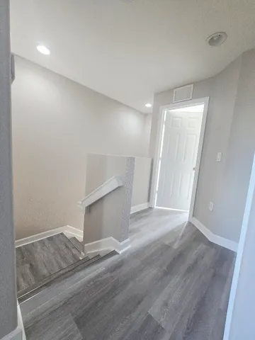 a view of livingroom with wooden floor