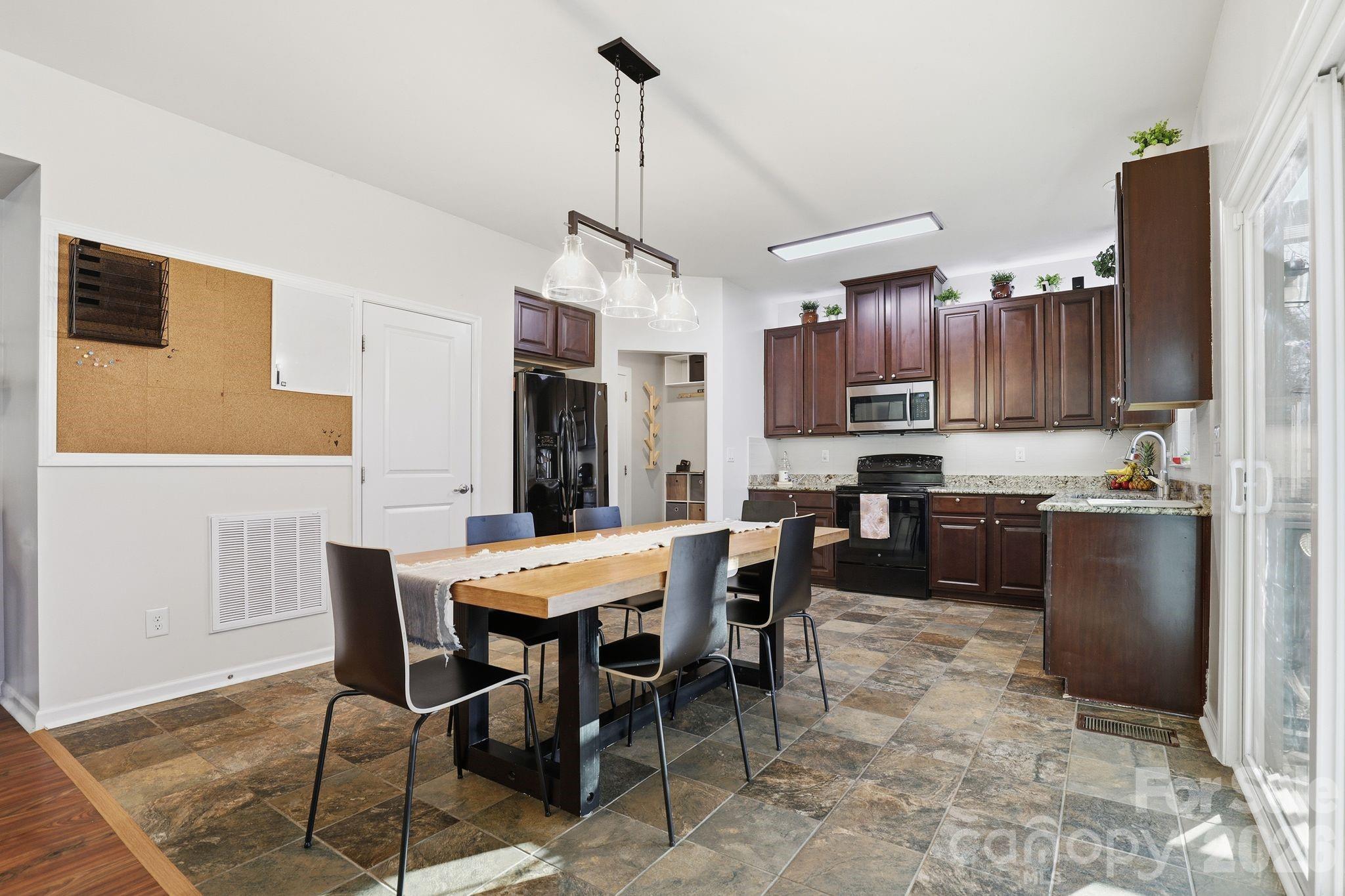7532 West Berkeley Road, Unit 25 Denver, NC 28037 - Photo 11 of 36 a view of kitchen with sink and refrigerator