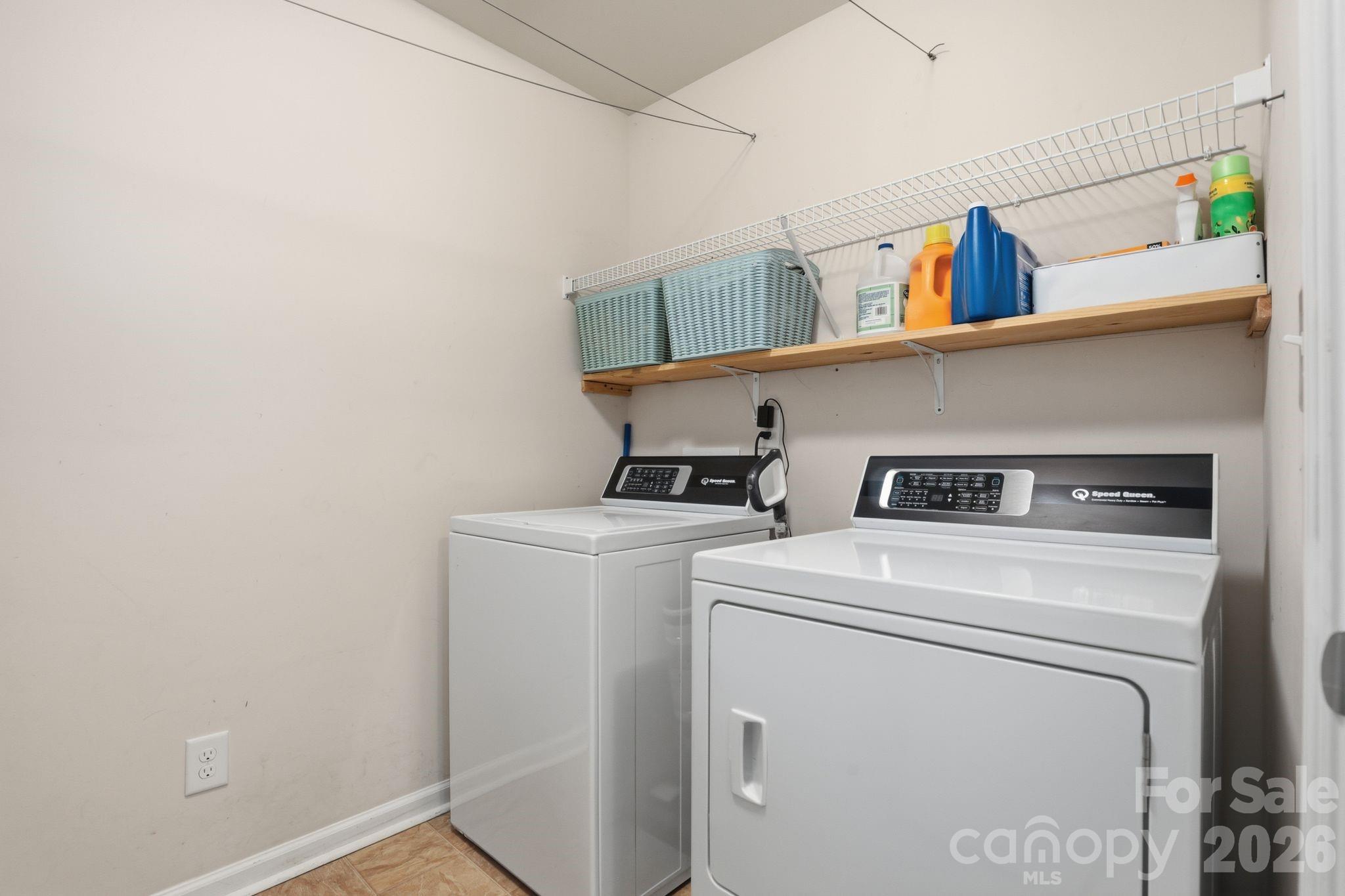 7532 West Berkeley Road, Unit 25 Denver, NC 28037 - Photo 16 of 36 a utility room with dryer and washer