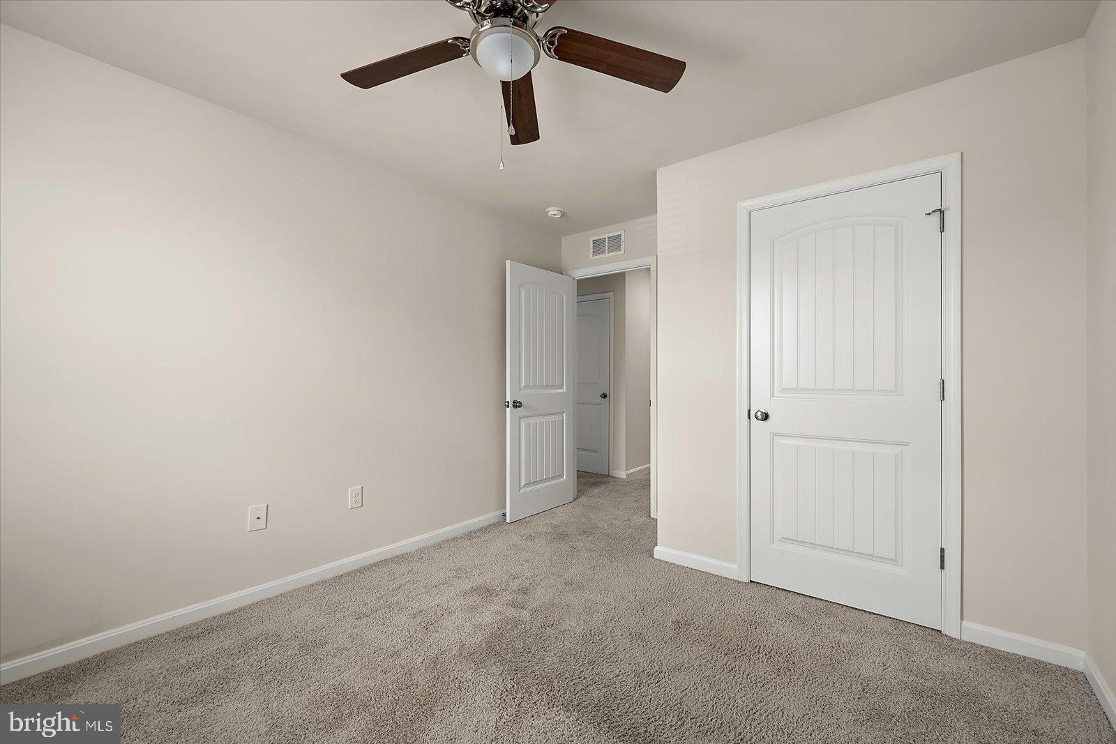 3 Orchard Road Seaford, DE 19973 - Photo 19 of 45 an empty room with closet and a chandelier fan