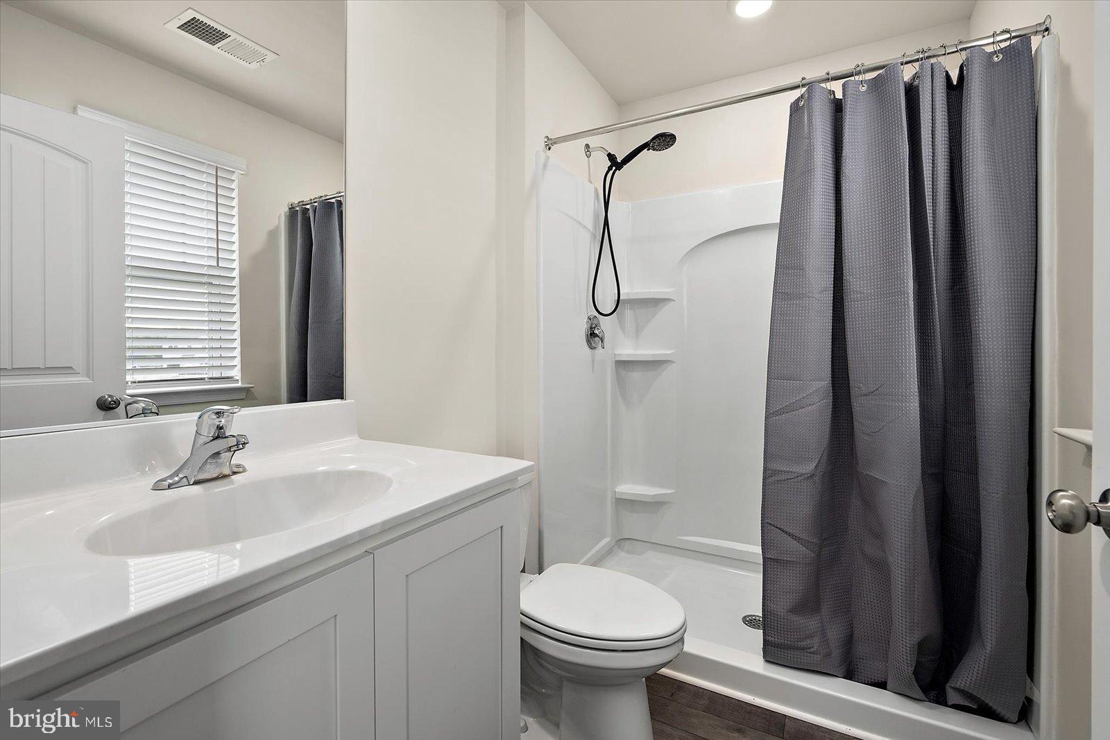 3 Orchard Road Seaford, DE 19973 - Photo 28 of 45 a bathroom with a sink toilet and shower