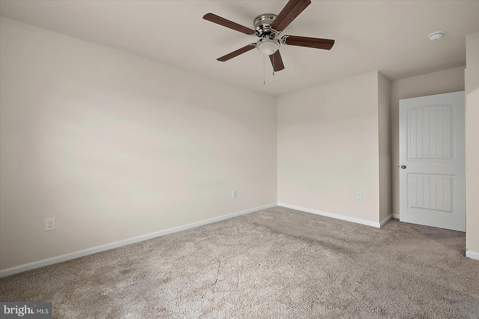 3 Orchard Road Seaford, DE 19973 - Photo 30 of 45 an empty room with a window and a fan