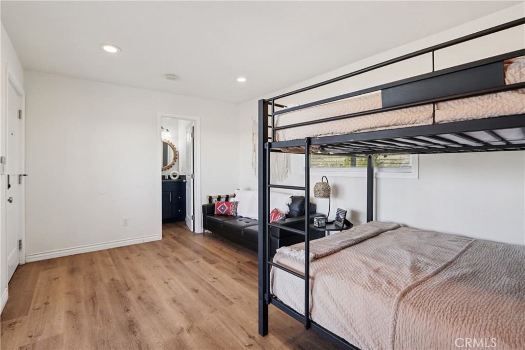 5235 Border Avenue Joshua Tree, CA 92252 - Photo 25 of 63 a bedroom with a bed and a walk in closet