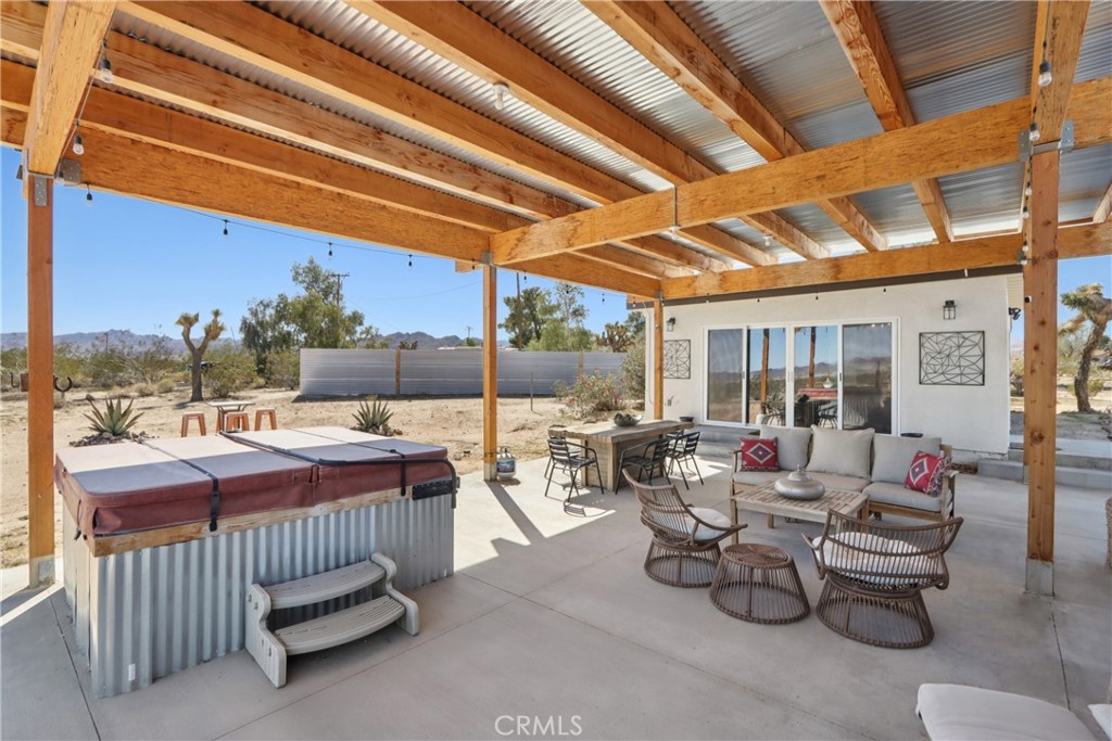 5235 Border Avenue Joshua Tree, CA 92252 - Photo 32 of 63 a outdoor space with patio couch and outdoor seating