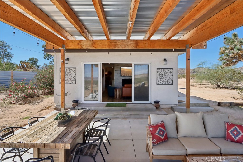 5235 Border Avenue Joshua Tree, CA 92252 - Photo 38 of 63 a outdoor space with patio lots of furniture