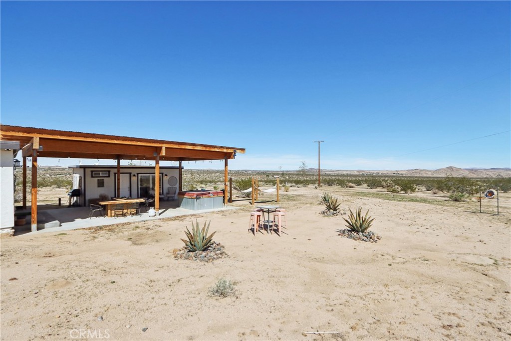 5235 Border Avenue Joshua Tree, CA 92252 - Photo 44 of 63 a view of a lake and a beach