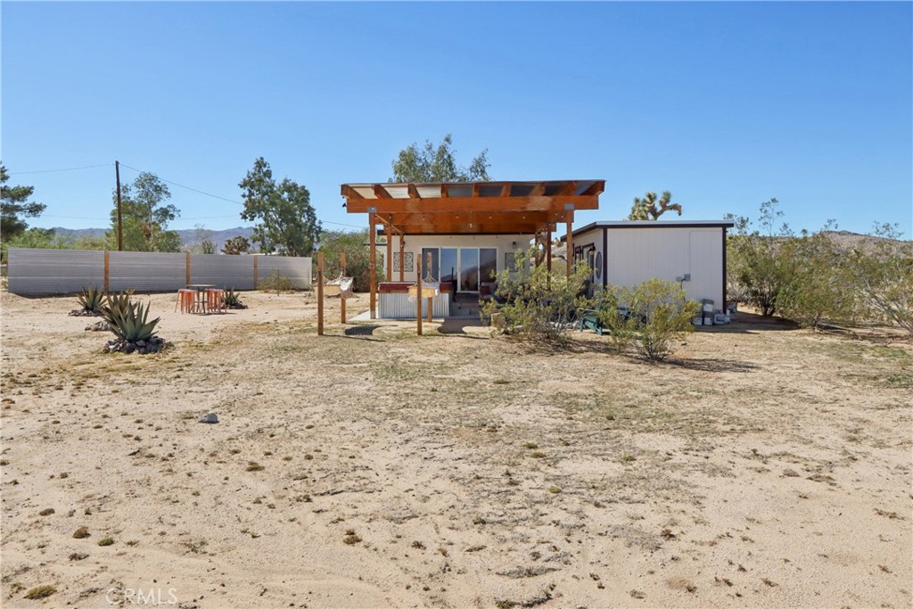 5235 Border Avenue Joshua Tree, CA 92252 - Photo 46 of 63 a view of a house with a outdoor space