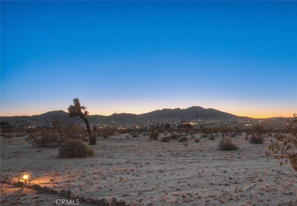 5235 Border Avenue Joshua Tree, CA 92252 - Photo 48 of 63 a view of mountain and a field