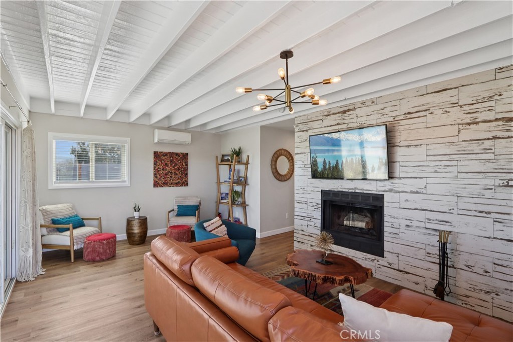 5235 Border Avenue Joshua Tree, CA 92252 - Photo 6 of 63 a living room with furniture and a fireplace
