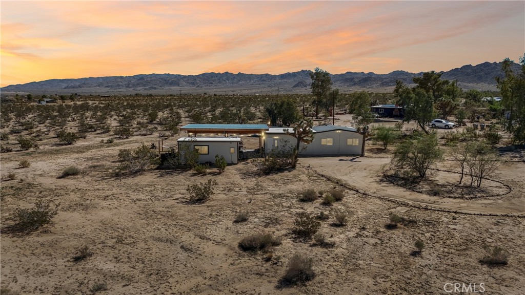 5235 Border Avenue Joshua Tree, CA 92252 - Photo 62 of 63 a view of a town with mountains in the background