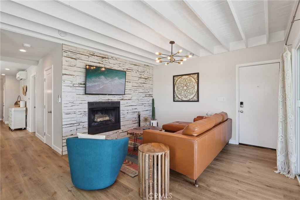 5235 Border Avenue Joshua Tree, CA 92252 - Photo 7 of 63 a living room with furniture and a fireplace