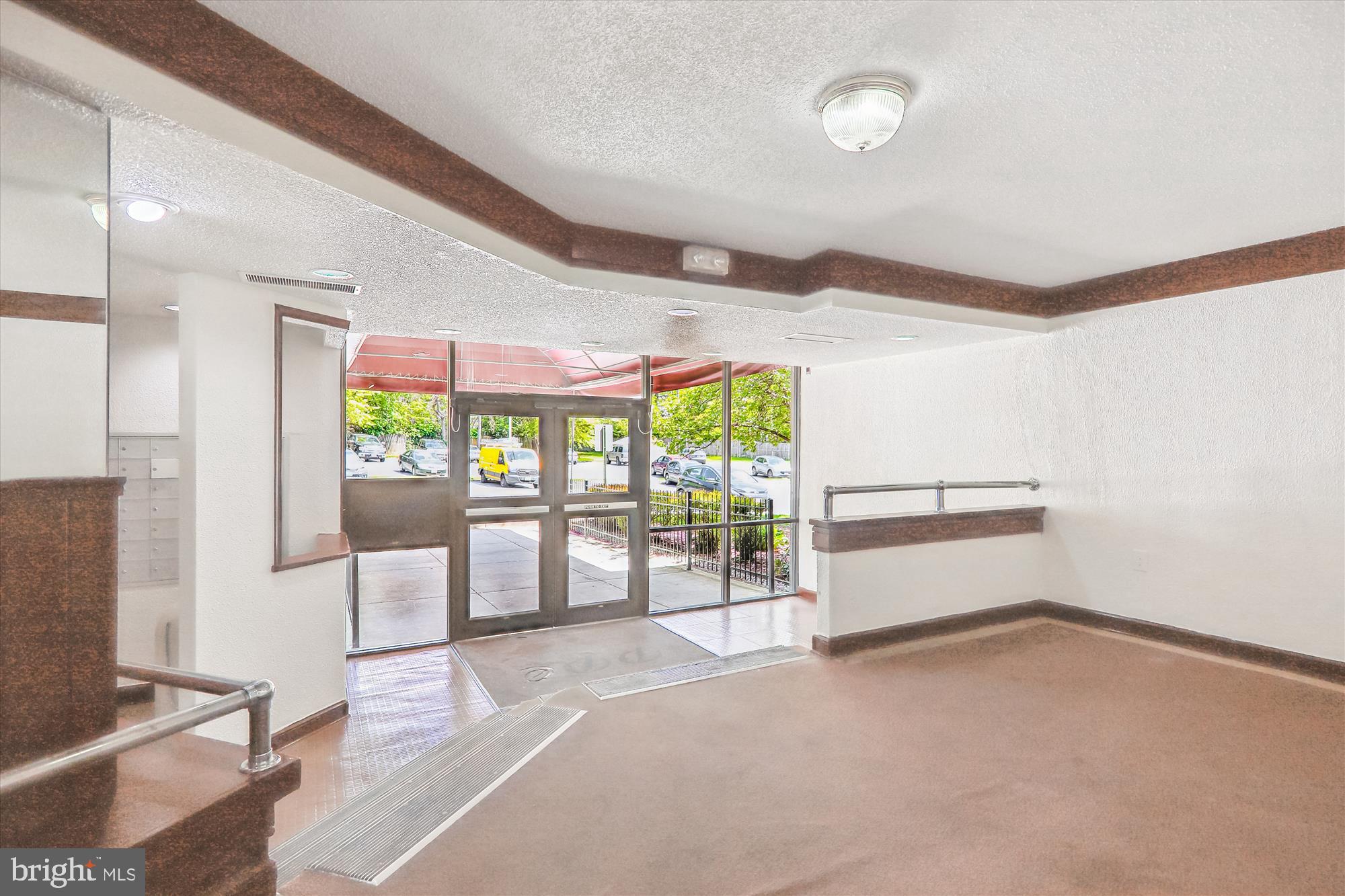 1826 Metzerott Road, Unit 207 Adelphi, MD 20783 - Photo 22 of 26 Spacious Lobby, Elevator Building