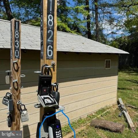 1826 Metzerott Road, Unit 207 Adelphi, MD 20783 - Photo 26 of 26 Lockbox on pole next to storage shed