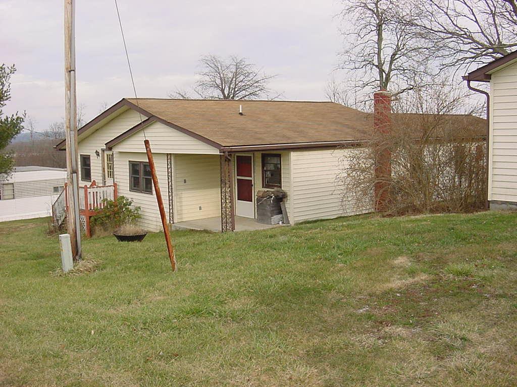 360 Wills Ridge Road Northwest Floyd, VA 24091 - Photo 1 of 6 a house view with a garden space