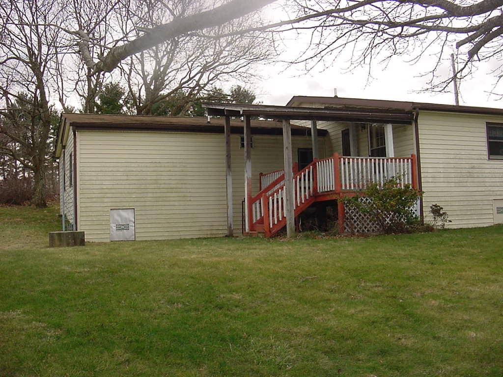 360 Wills Ridge Road Northwest Floyd, VA 24091 - Photo 4 of 6 a view of a house with a yard