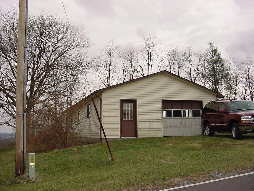 360 Wills Ridge Road Northwest Floyd, VA 24091 - Photo 6 of 6 a view of a house with a backyard