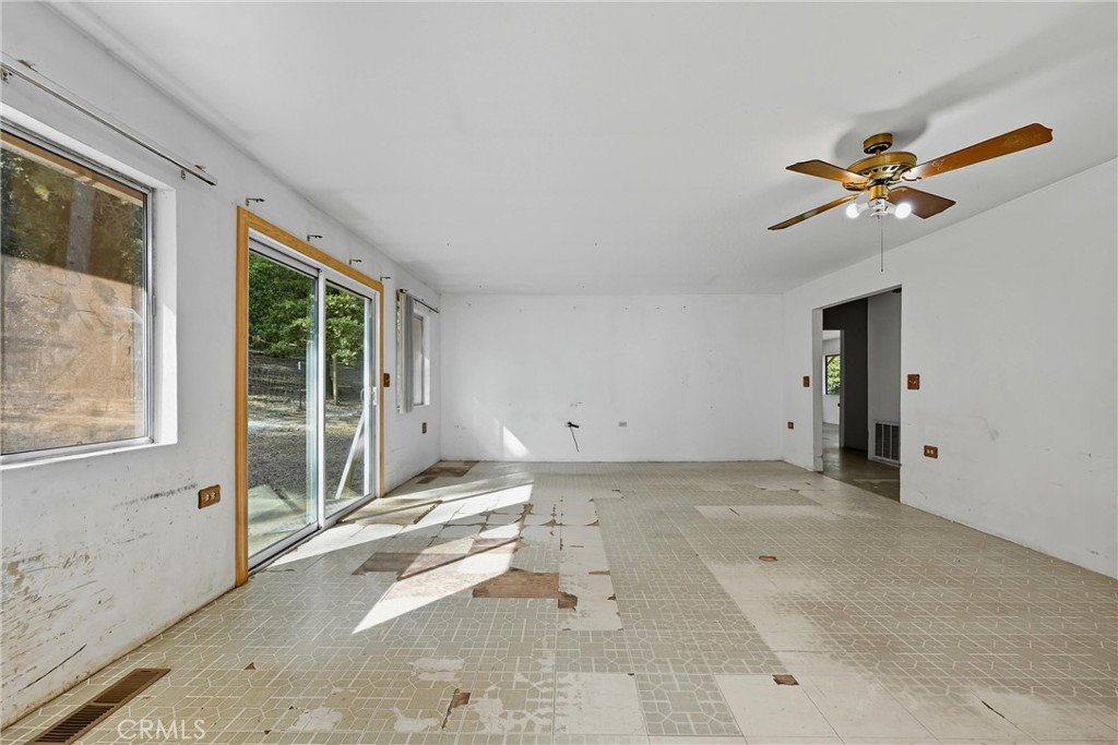13028 Riata Road Lower Lake, CA 95457 - Photo 11 of 40 a view of a room with a ceiling fan and window