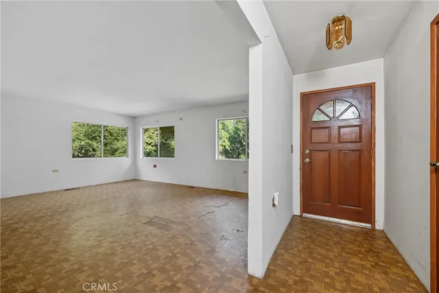 an empty room with windows