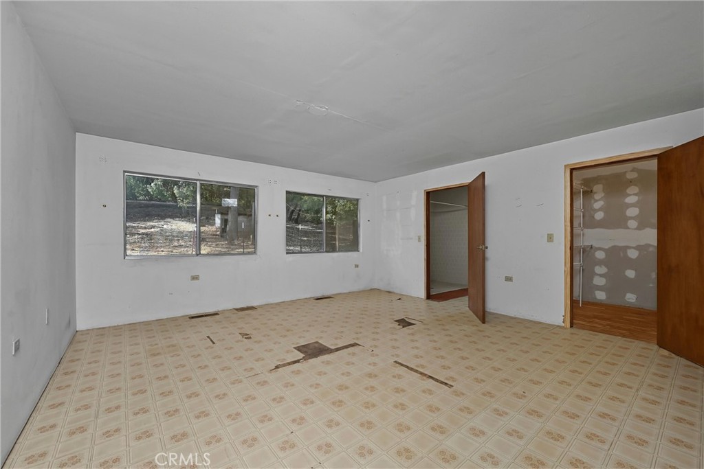 13028 Riata Road Lower Lake, CA 95457 - Photo 15 of 40 a view of an empty room with a window
