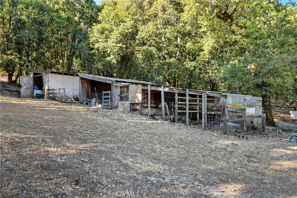 13028 Riata Road Lower Lake, CA 95457 - Photo 31 of 40 a view of a house with backyard