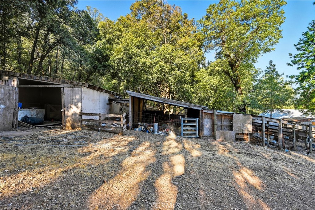 13028 Riata Road Lower Lake, CA 95457 - Photo 32 of 40 a view of a house with a patio
