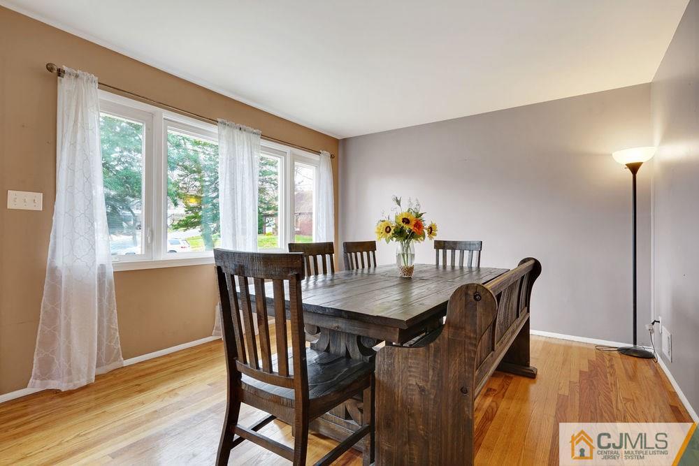 38 Montview Road Edison, NJ 08837 - Photo 11 of 25 a view of a dining room with furniture and wooden floor