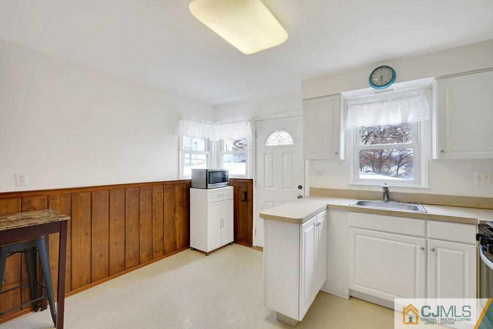 38 Montview Road Edison, NJ 08837 - Photo 14 of 25 a kitchen with a sink cabinets and window