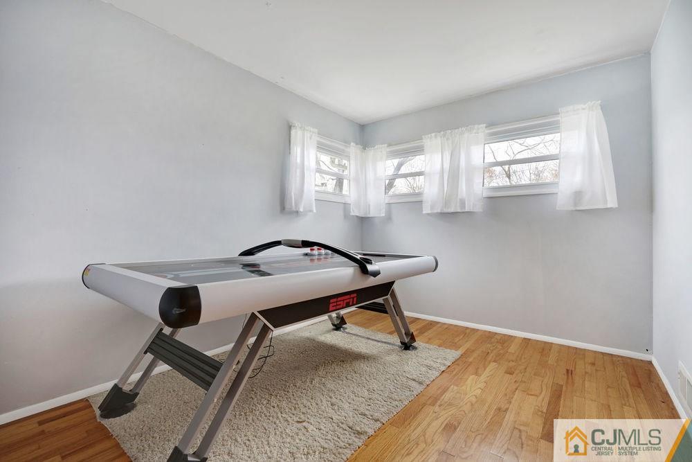 38 Montview Road Edison, NJ 08837 - Photo 19 of 25 a view of a workspace with furniture and a window