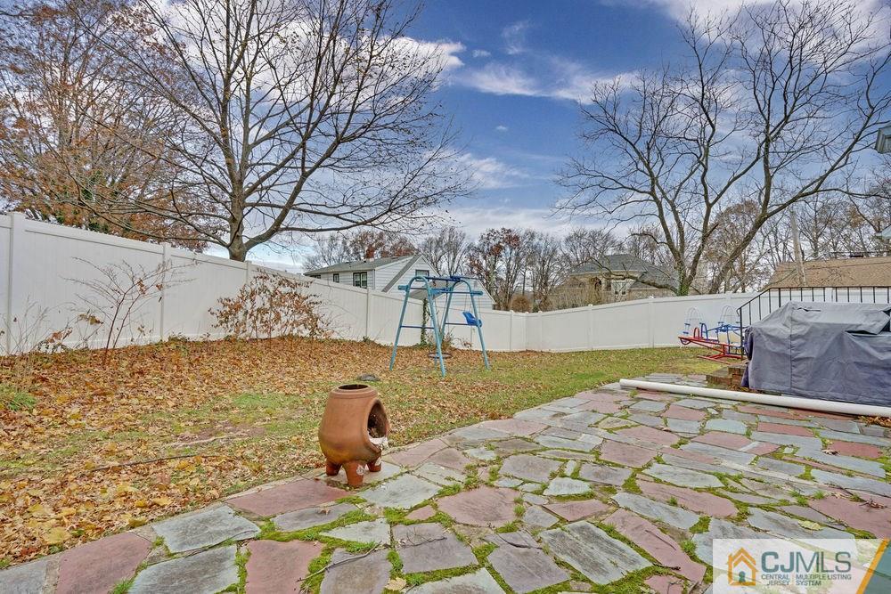 38 Montview Road Edison, NJ 08837 - Photo 22 of 25 a view of a yard with an trees