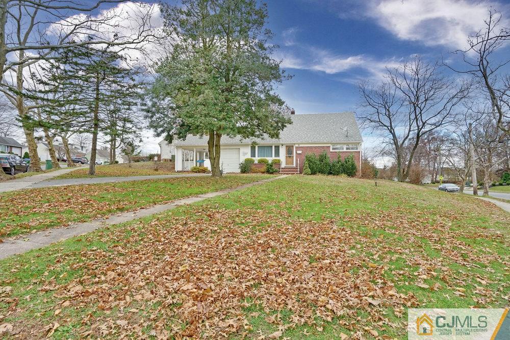 38 Montview Road Edison, NJ 08837 - Photo 24 of 25 a view of a yard with a house in the background