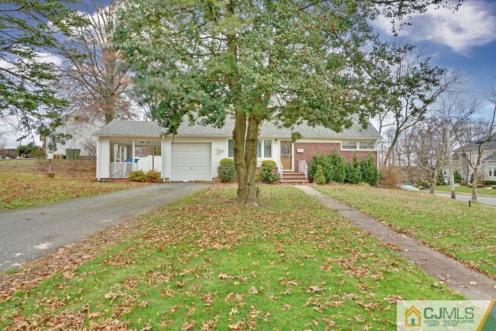 38 Montview Road Edison, NJ 08837 - Photo 25 of 25 a front view of a house with garden