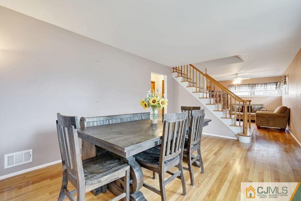 38 Montview Road Edison, NJ 08837 - Photo 10 of 25 a dining room with furniture and wooden floor