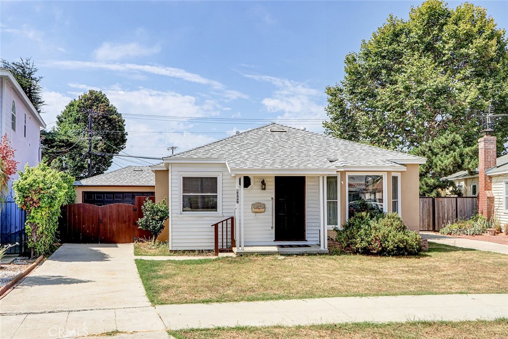8057 Nardian Way Los Angeles, CA 90045 - Photo 1 of 2 a front view of house with yard and trees around