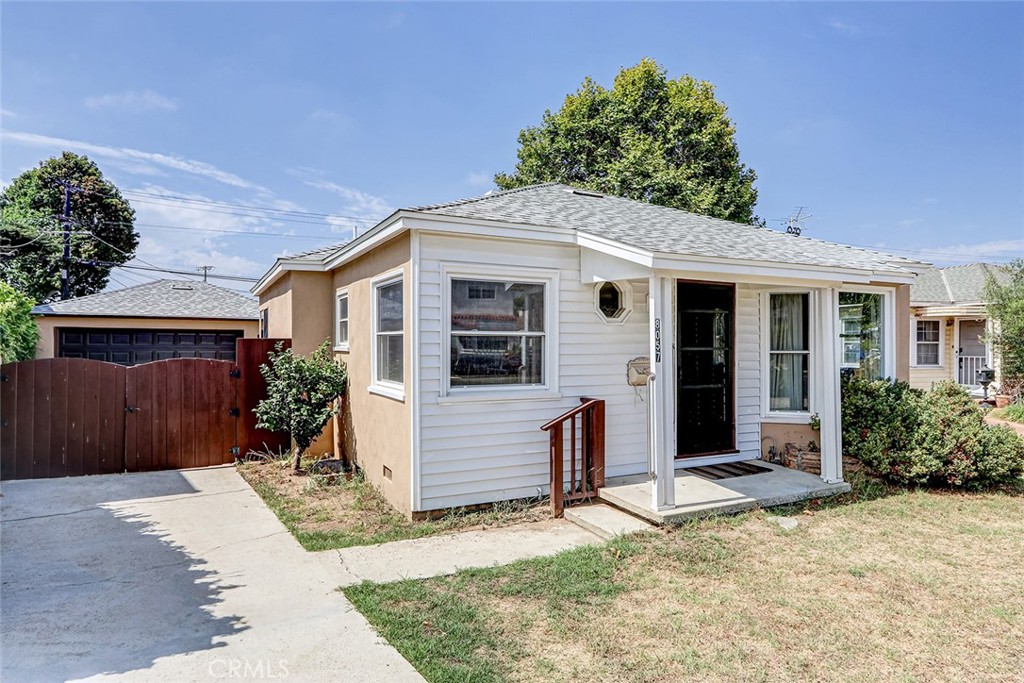 8057 Nardian Way Los Angeles, CA 90045 - Photo 2 of 2 front view of a house with a yard